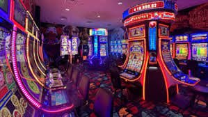 Colorful slot machine reels showing jackpot symbols on a mobile screen